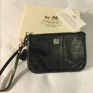 Coach brand black patent leather wristlet wallet